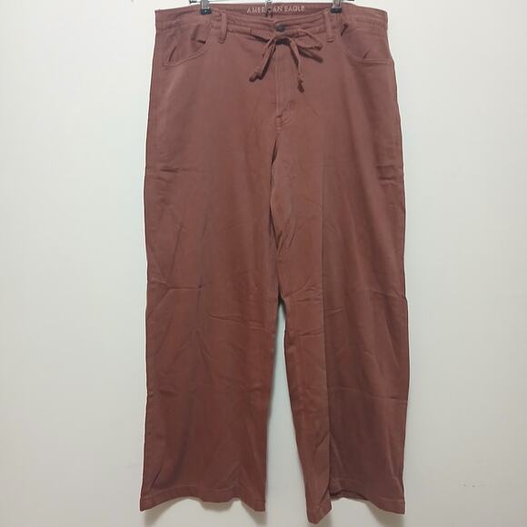 American Eagle Dreamy Drape Low-Rise Ultra Wide-Leg Jean Size 12 Dark Rust Boho - Picture 1 of 9